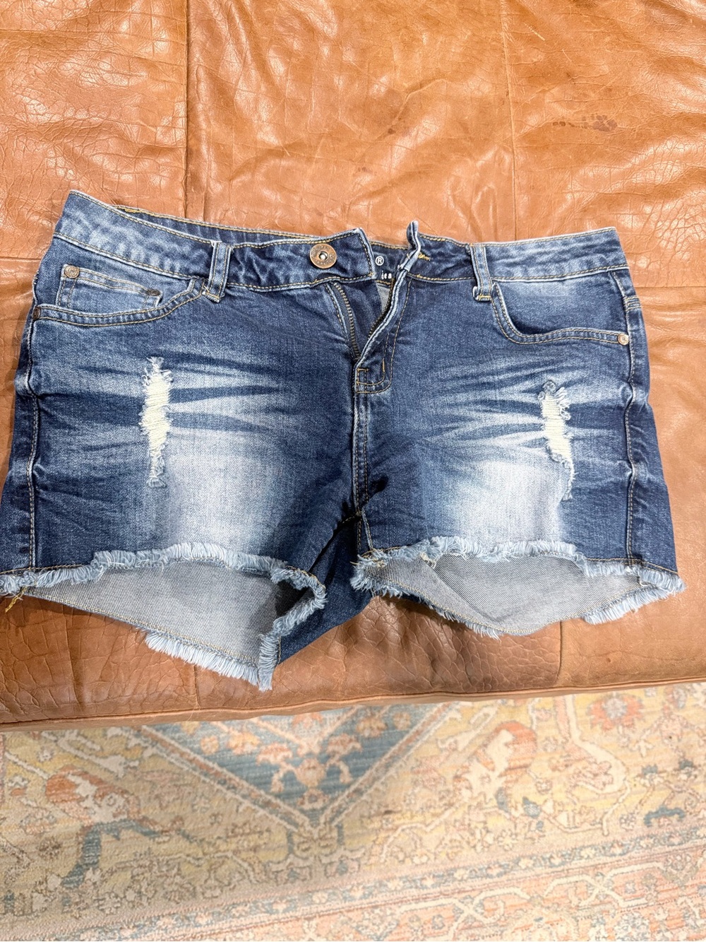 Women’s Distressed Blue Denim Jean Shorts with Frayed Hem